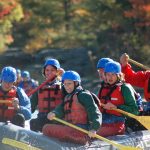 Allegheny College students raft a river