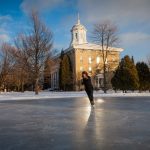 A Lawrence University student ice skates on campus