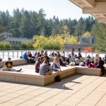 Faculty and students enjoy the library building roof deck