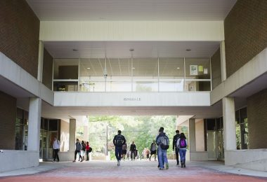 Hiram students stroll through the Hinsdale Arch