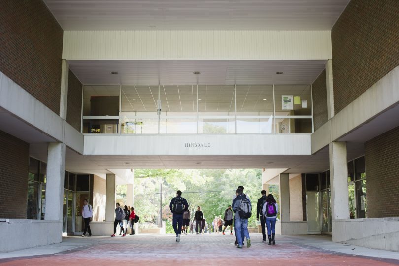 Hiram students stroll through the Hinsdale Arch