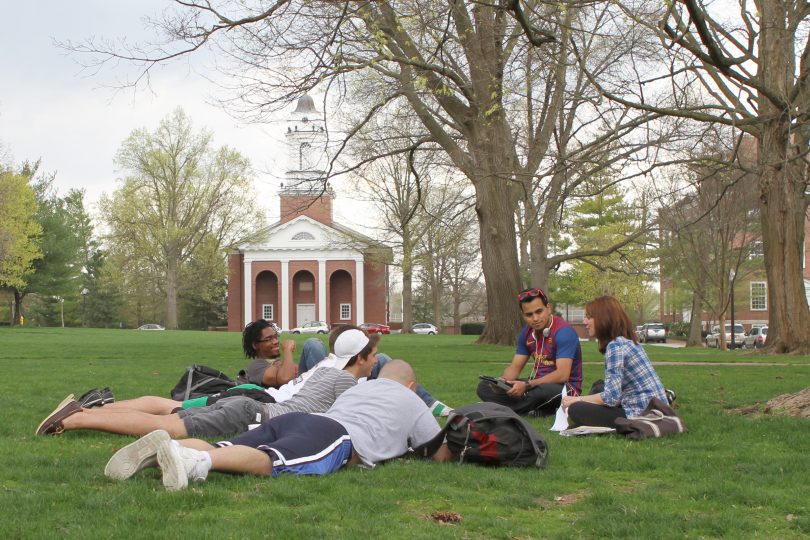 Wabash College students hang out on the campus lawn