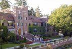 University of Puget Sound student gather in front of a campus building together