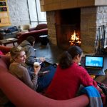St. Olaf College students study in front of the fireplace