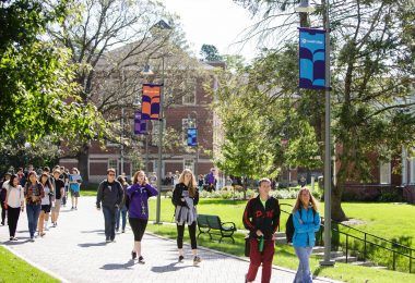 Cornell College students walk to class on a sunny fall day