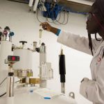 Bard Student working on a chemistry experiment