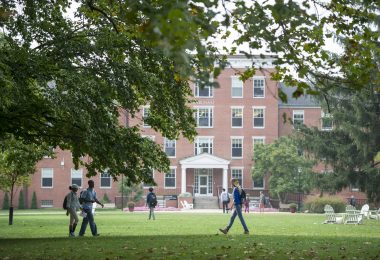 Students walk across the Earlham College campus
