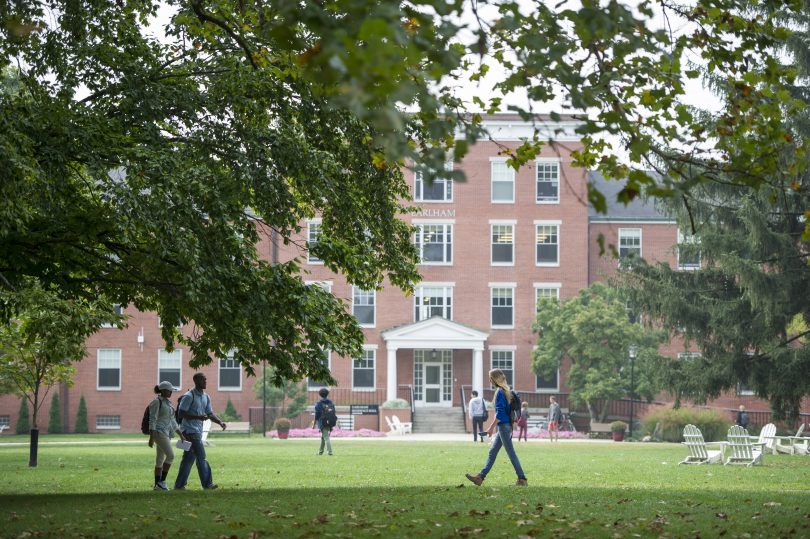 Students walk across the Earlham College campus