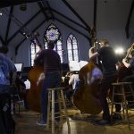Cornell College students perform in a band together