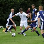 Earlham College varsity soccer team plays in a match