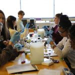 Hampshire College students in a science lab