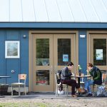 Hampshire College students enjoy a meal together