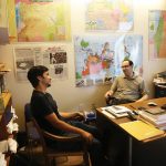 Hampshire College student meets with a professor