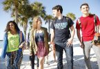 Eckerd College students walk to class on a sunny day