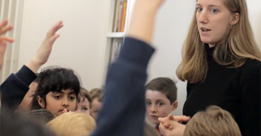 Clark University student works with children