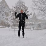 A St. Olaf student skis across campus