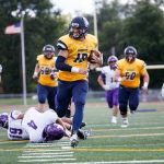 Beloit College varsity football players on the field