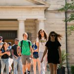Students walk by Slocum Hall, Ohio Wesleyan University