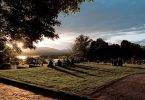 Bard students watch the sun set at Blithewood.