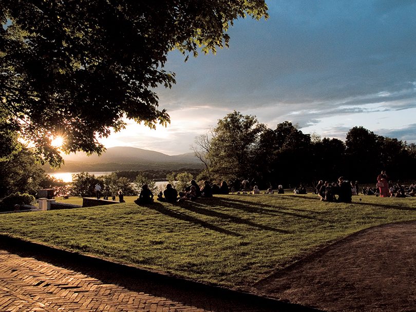 Bard students watch the sun set at Blithewood.