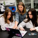 Students in the graduate program in Data Science review class material. 