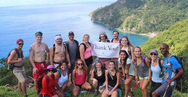 Eckerd students pose together on Dominica during a study abroad term.