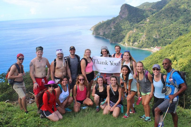 Eckerd students pose together on Dominica during a study abroad term.