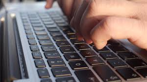 fingers on a keyboard