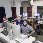 professor talks to student