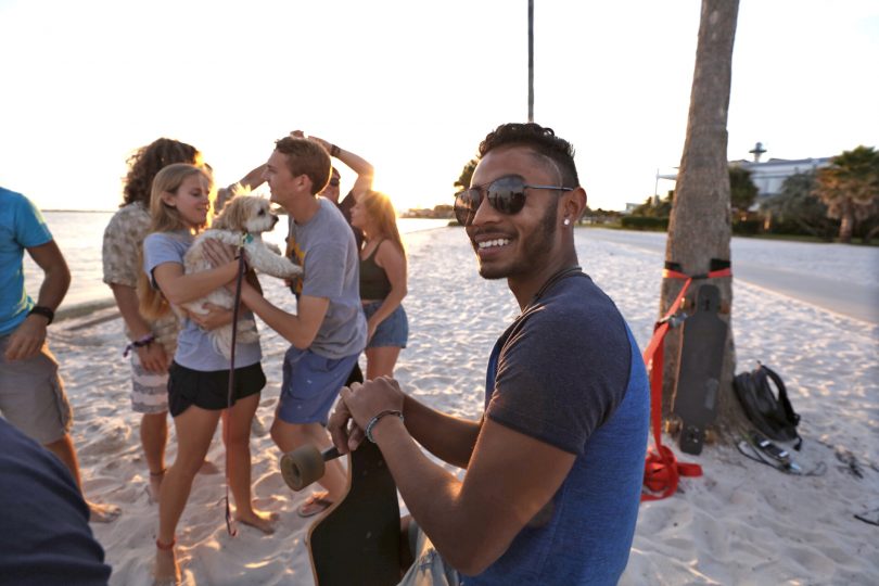 Sakerian Morris '20 and students hanging out on South Beach