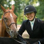 An equestrian rider and her horse