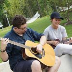 Students playing instruments outdoors