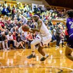 A Guilford College Men’s Basketball player gets set for a shot during an NCAA Tournament match-up.