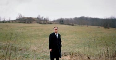 Rob Billott standing in a field